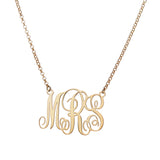 Raffinata collana con monogramma barocco