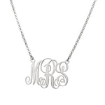 Raffinata collana con monogramma barocco