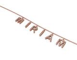 Bracciale con una o più lettere in oro rosa e pavé di diamanti